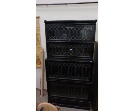 A Globe- Wernicke style leaded glazed sectional bookcase