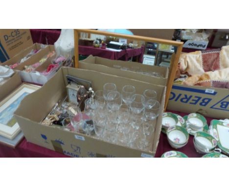 A box of glassware and sundries, terrestrial globe, mirror and a table lamp