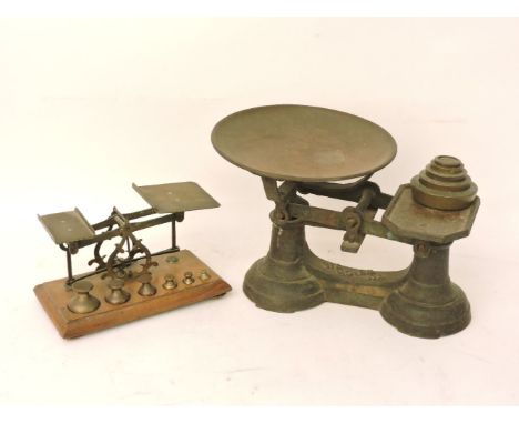 Victorian postal scales, kitchen scales, and a pair of gilt mirrors