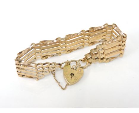 A 9ct gold five row gate link bracelet, with padlock, 10.58g