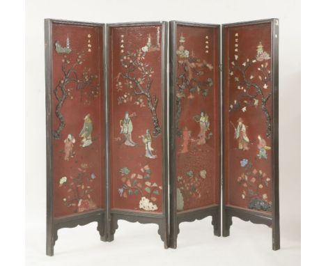 A 19th century hongmu four-fold screen, each panel mixed media onlaid with jade, soapstone, amethyst, bone and wood depicting