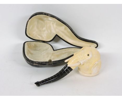 A meerschaum pipe in the form of an elephant's head and trunk, in a leather case, 12.5cm