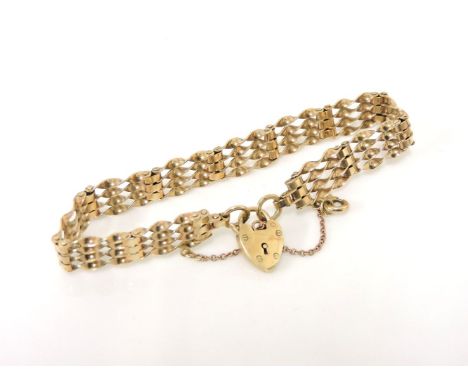 A 9ct gold four row twisted gate link bracelet with padlock, 11.79g