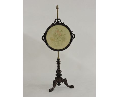 A Victorian mahogany pole screen, with embroidered pane on tripod base