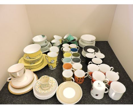 Twelve Susie Cooper coffee cups, six Wedgwood Corn Poppy design cups, saucers and plates, and another continental Art Deco st