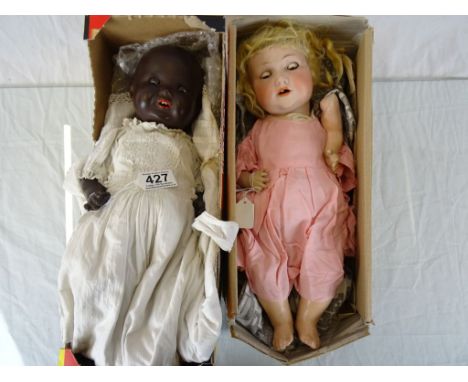 Early 20th century Armand Marseille Bisque Headed Black Doll with sleeping brown eyes and open mouth with teeth, impressed to