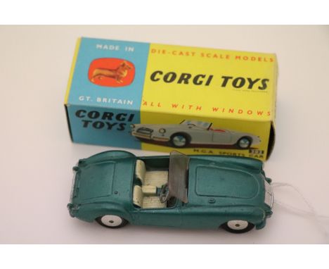 Boxed Corgi 302 MGA Sports Car in metallic green, with windscreen, diecast vg but a little grubby, box vg