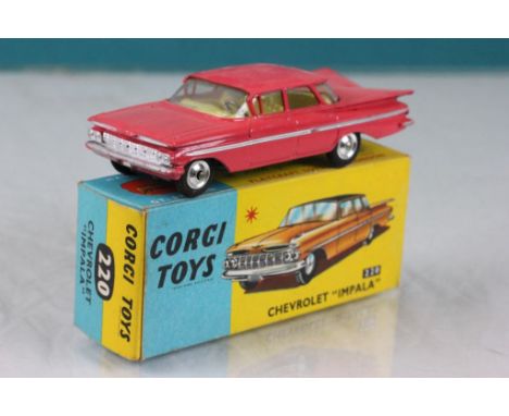 Boxed Corgi 220 Chevrolet Impala in pink diecast vg with minor paint chips, box excellent