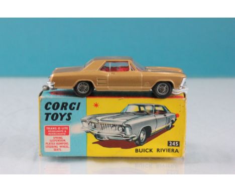 Boxed Corgi 245 Buick Riviera in gold with red interior, diecast excellent, box gd