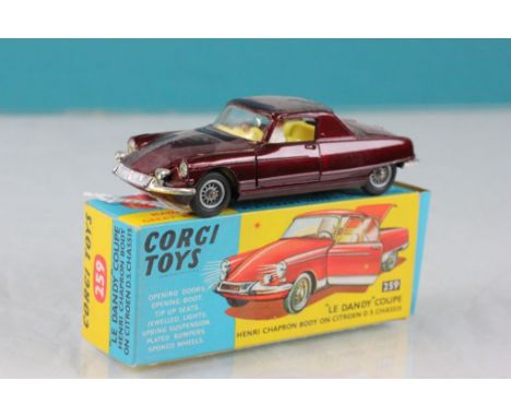 Boxed Corgi 259 Le Dandy Coupe Henri Chapron Body on Citroen DS Chassis in dark metallic red with yellow interior, diecast ex