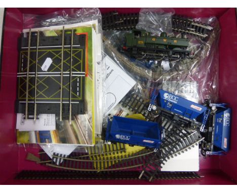 Group of OO gauge model railway to include Bachmann GWR Tank Engine, 3 x Hornby wagons and track