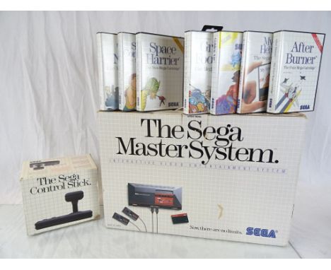 Retro Gaming - Boxed Sega The Sega Master System, boxed Sega Control Stick and 7 boxed games to include Golden Axe, Great Foo