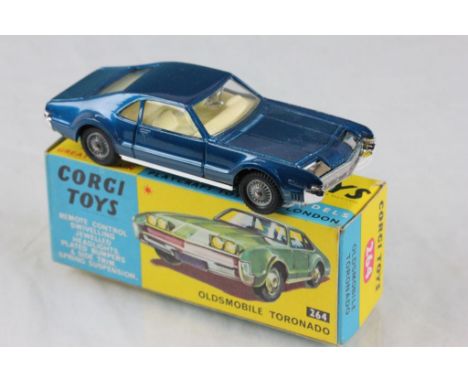 Boxed Corgi 264 Oldsmobile Tornado in metallic blue with white interior, diecast excellent, box vg
