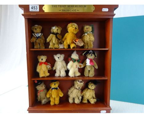 Collection of 12 Danbury Mint  'The Teddy Bear Museum Showcase' bears in collectors shelf unit with COA.  Serial 2754