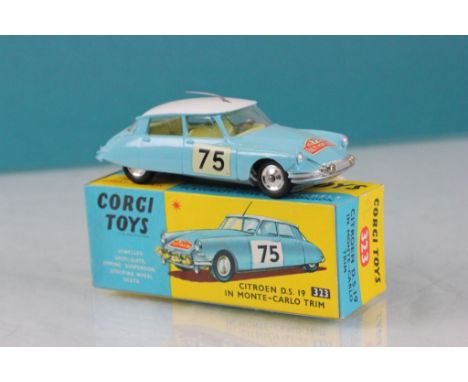 Boxed Corgi 323 Citroen DS 19 in Monte Carlo Trim in pale blue with white roof, race number 75, aerial in tact, diecast & box