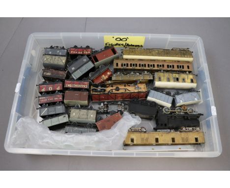 Collection of 35 OO gauge kit built rolling stock items and one engine contained in two plastic containers