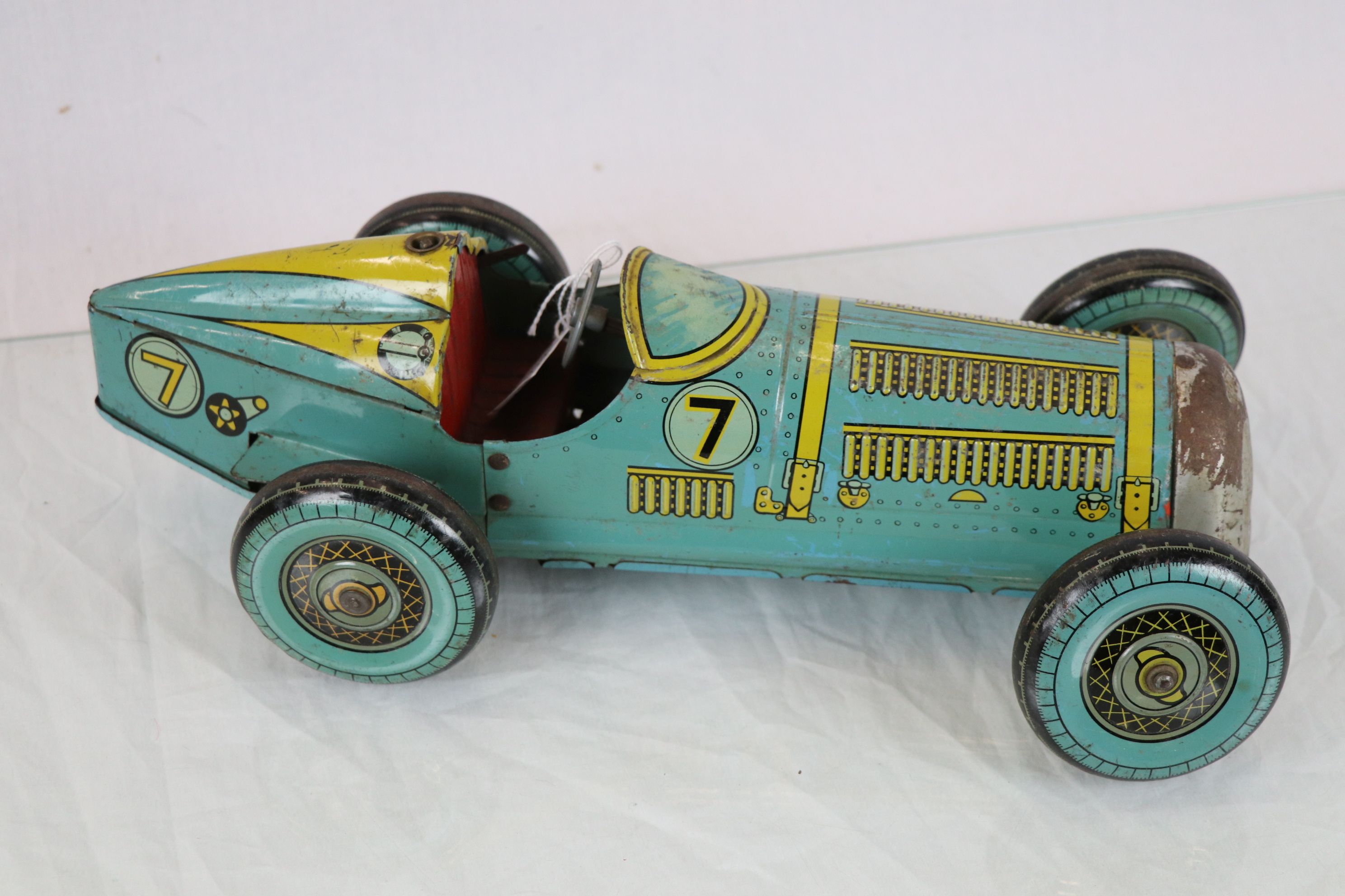 Mettoy tin plate clockwork racing car in pale blue with yellow & black ...