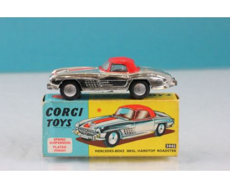 Boxed Corgi 304S Mercedes Benz 300SL Hard Top Roadster in silver and red, some paint loss otherwise vg, box gd-vg