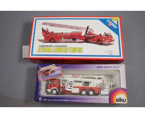 Two boxed fire engines to include Siku 3720 Snorkel Fire Engine & Corgi C1143/2 American LaFrance Aerial Ladder Truck