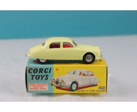 Boxed Corgi 208S Jaguar 2.4 Litre Saloon in pale yellow with red interior, diecast vg, box gd/vg