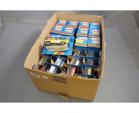 Twelve Boxed Mattel Hot Wheels Diecast Cars together with Fourteen Mattel Super Hot Wheels Cars in Blister Packs