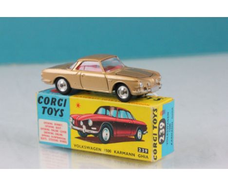 Boxed Corgi 239 Volkswagen 1500 Karmann Ghia in gold with red interior, spare tyre and bag, diecast excellent with minor pain