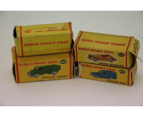 Four boxed Dinky Dublo vehicles to include 063 Commer Van (missing end flaps), 064 Austin Lorry, 062 Singer Roadster and 069 