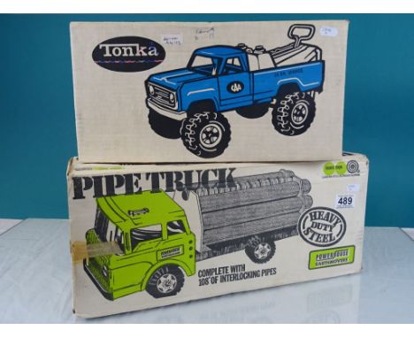 Tonka, Boxed 24 Hour Service Truck 2590 together with a Boxed Marx Toys Pipe Truck