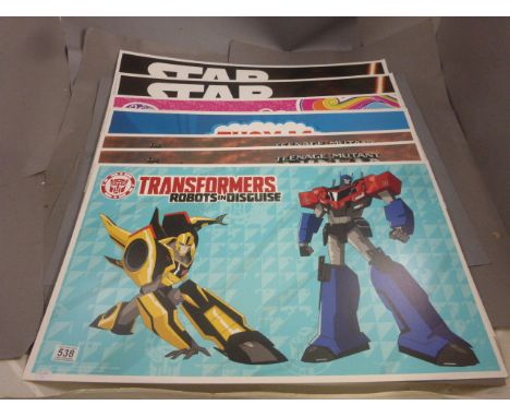Seven large promotional movie/TV advertising cards to include Teenage Mutant Ninja Turtles x 2, My Little Pony, Transformers,