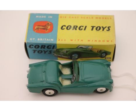 Boxed Corgi 301 Triumph TR2 Sports Car in green, windscreen excellent, diecast vg, box gd but showing wear