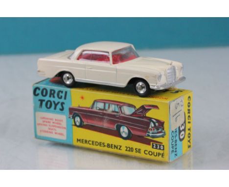 Boxed Corgi 230 Mercedes Benz 220 SE Coupe in cream with red interior, diecast excellent,box vg showing some corner wear 