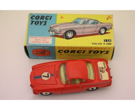 Boxed Corgi 228 Volvo P 1800 in red with race number 7 and 'I've got a Tiger in my tank' sticker to the boot, pale yellow int