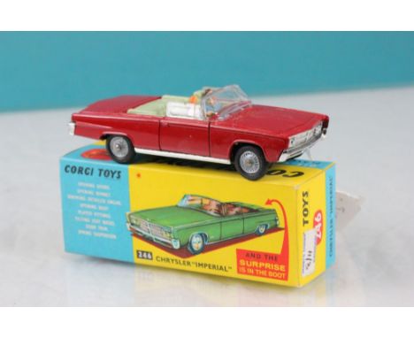 Boxed Corgi 246 Chrysler Imperial in red with golf clubs, driver & passenger, diecast & box excellent