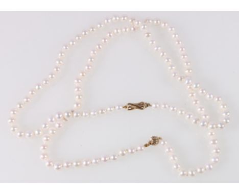 Two freshwater pearl necklaces with gold snap.