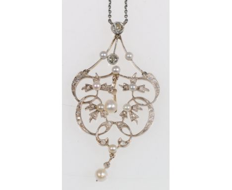 Edwardian gold openwork pendant with oriental pearls and scrolls of tiny rose diamonds.   CONDITION REPORT:  55mm from diamon