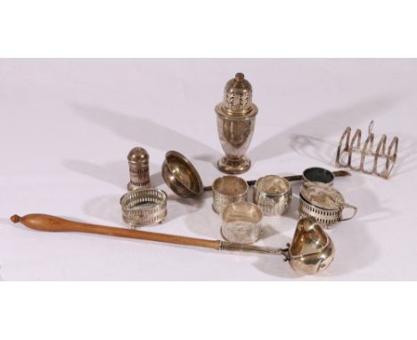 Georgian silver ladle stamped with makers marks IW, another, a silver five bar toast rack, sugar castor, napkin rings, cruets