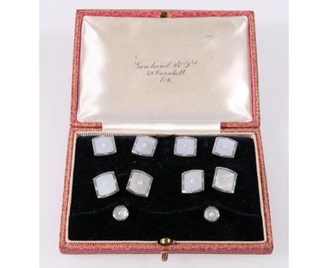 Set of dress studs, links and buttons each with a pearl upon mother of pearl within platinum border '18ct pt' in Gowland, Lon