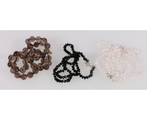 Freshwater pearl necklet and two others quartz. (3)