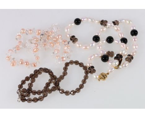Smoky quartz bead necklet, another with pearls and crystal and a freshwater pearl and onyx bead necklet. (3)