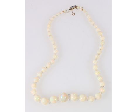 Opal graduated bead necklet with faceted crystals on diamond set box snap. 38cm approx, 23g   CONDITION REPORT:  It is probab