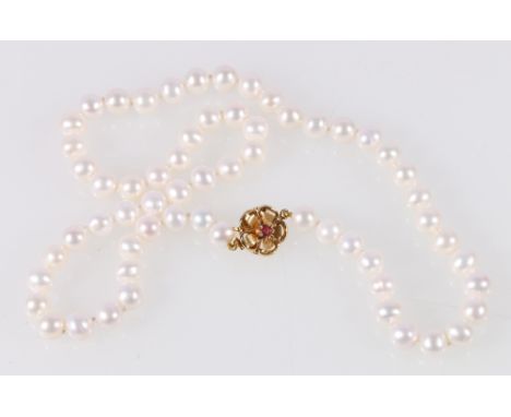 Freshwater pearl necklet on ruby floral snap.