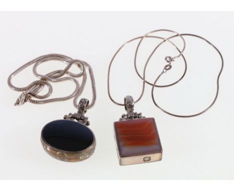 Silver mounted agate and mother of pearl pendant on fine silver chain and another set of blue agate CONDITION REPORT: Mother 