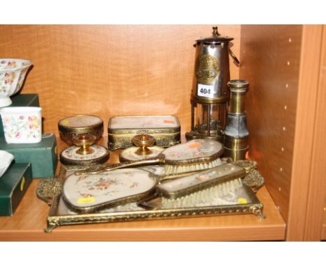 AN ECCLES PROTECTOR LAMP, a small brass telescope and petit point dressing table items