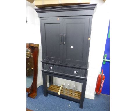 A PAINTED TWO DOOR KITCHEN CUPBOARD, with drawer and lower shelf containing various storage jars, bottles, etc (sd)