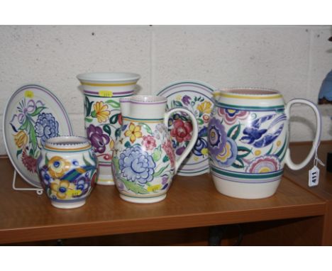 A GROUP OF POOLE POTTERY, to include 1950's jugs, one with impressed 127 and bluebird pattern, the other impressed 549, toget