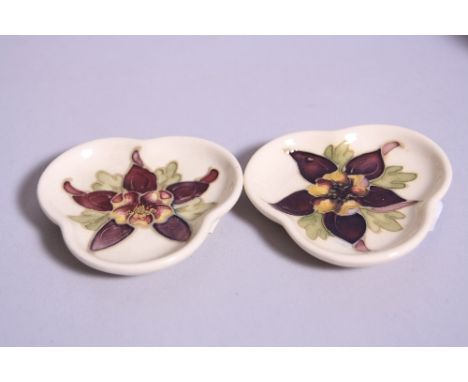 TWO MOORCROFT POTTERY TRINKET DISHES, Columbine pattern, impressed marks to base (2)