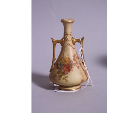 A SMALL ROYAL WORCESTER TWIN HANDLED BUD VASE, blush ivory, puce backstamp and No.1021, height 10.5cm