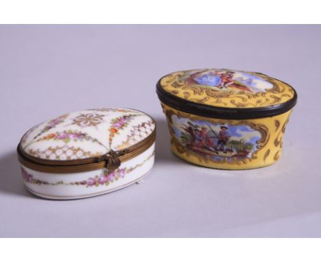 TWO 19TH CENTURY ENAMELLED OVAL TRINKET BOXES, the first with hand painted floral decoration with gilt highlights to cream gr