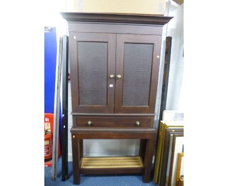 A PAINTED TWO DOOR KITCHEN CUPBOARD, with drawers and lower shelf containing various storage jars, bottles, etc (sd)