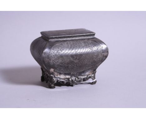 A VICTORIAN PEWTER TEA CADDY, of bombe form, having engine turned cartouches with floral and vine decoration, monogrammed FC,